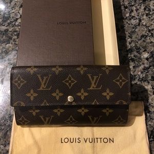Louis Vuitton Sarah Wallet with dust bag and box.